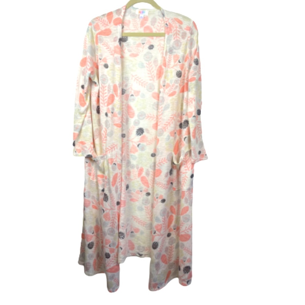 Large LuLaRoe calf length cardigan in playful colors.